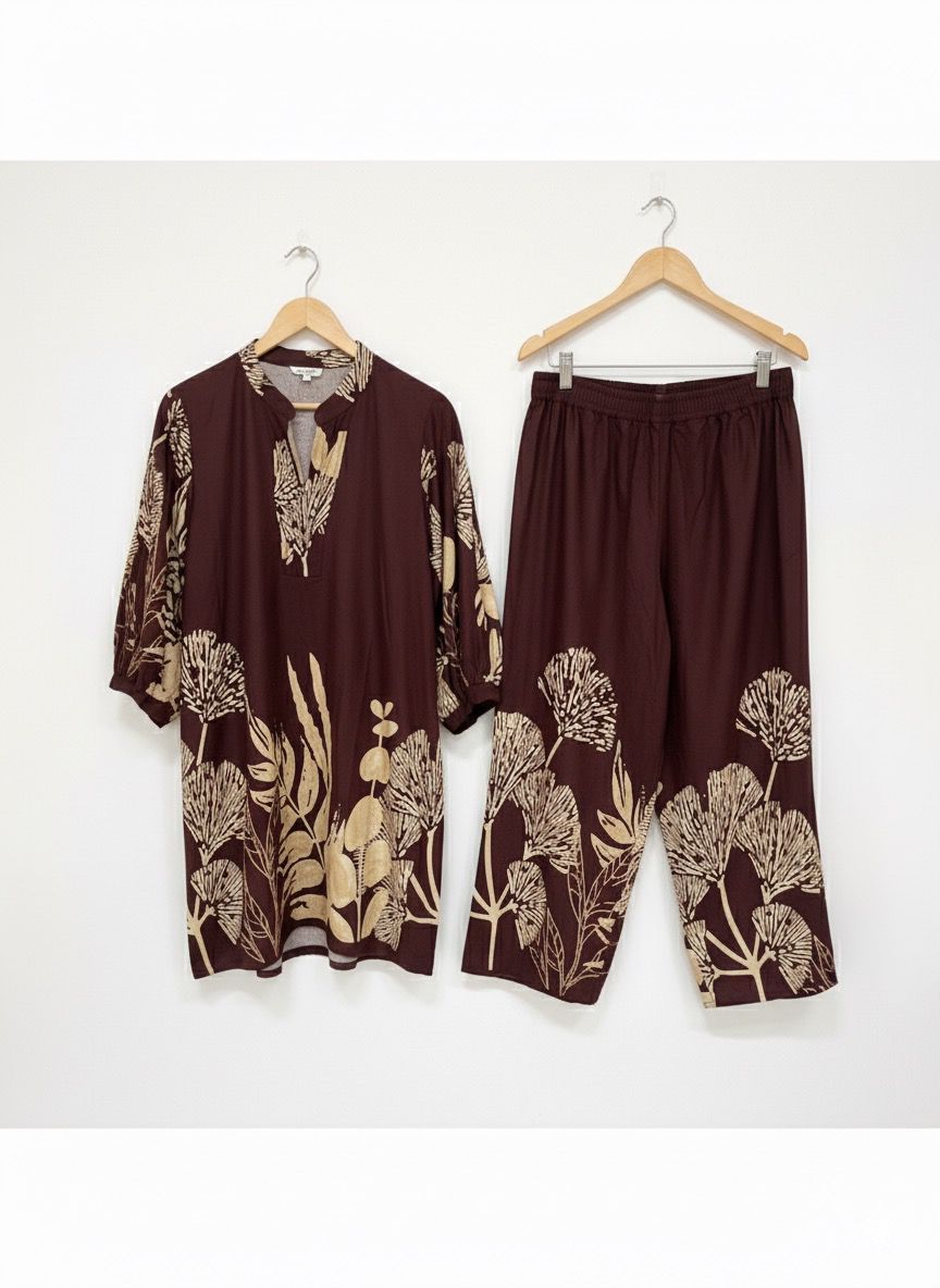 A relaxed-fit tunic top with a V-notch neckline