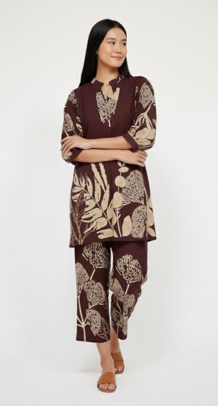 A relaxed-fit tunic top with a V-notch neckline